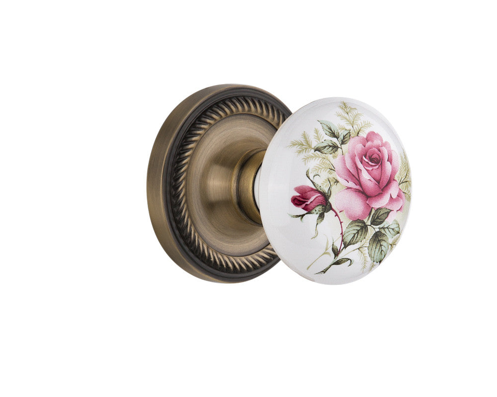 Nostalgic 711004: Rope Rosette w/White Rose Porcelain Knob Single Dummy Door Set - Antique Brass