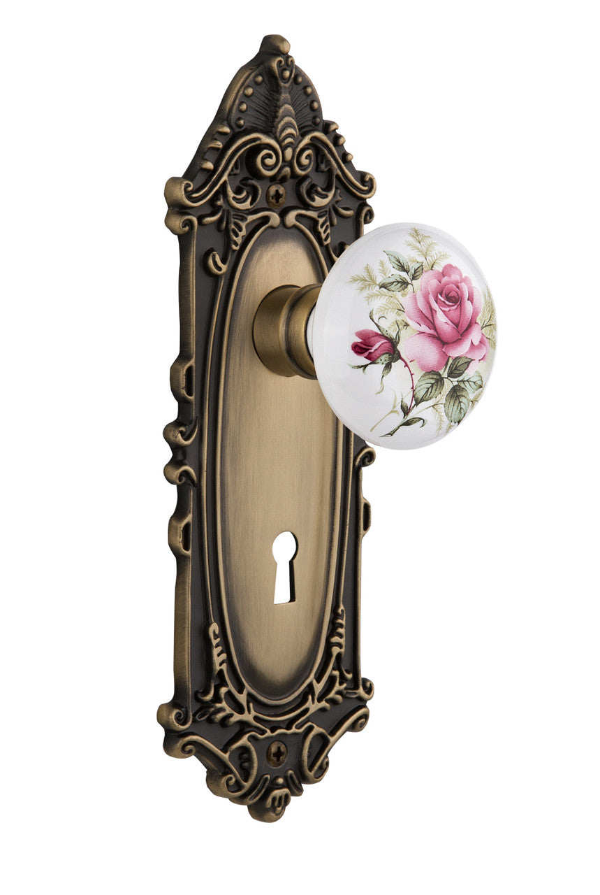 Nostalgic 711065: Victorian Backplate w/White Rose Porcelain Knob Single Dummy Door Set - Antique Brass