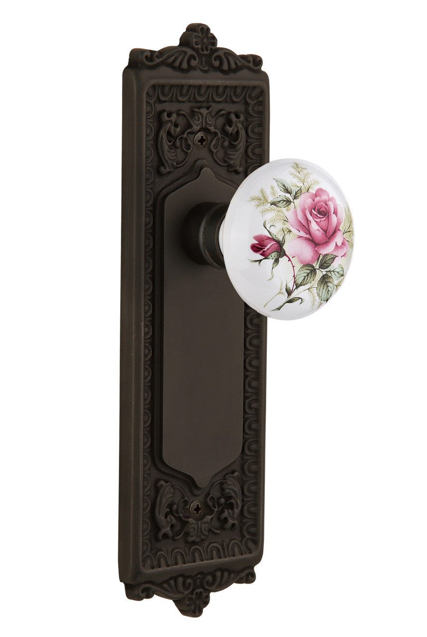 Nostalgic 711178: Egg & Dart Backplate w/White Rose Porcelain Knob Privacy Door Set - Oil-Rubbed Bronze