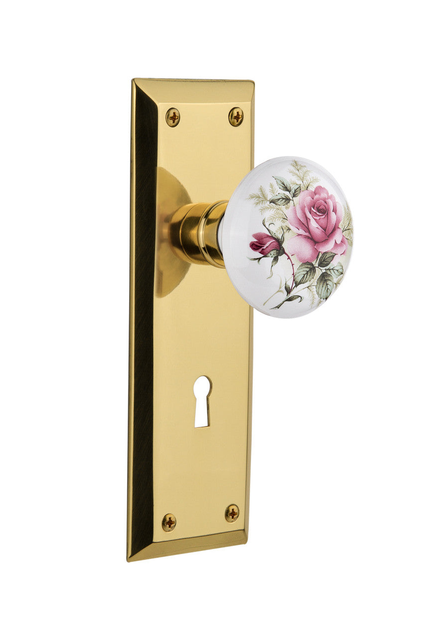 Nostalgic 711247: New York Backplate w/White Rose Porcelain Knob Privacy Door Set - Polished Brass