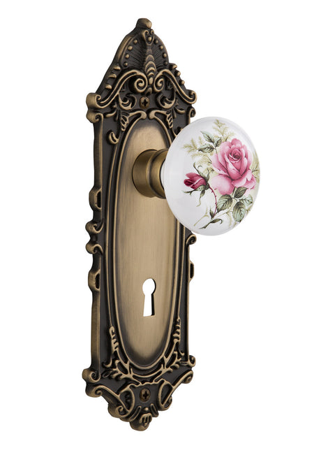 Nostalgic 711257: Victorian Backplate w/White Rose Porcelain Knob Privacy Door Set - Antique Brass