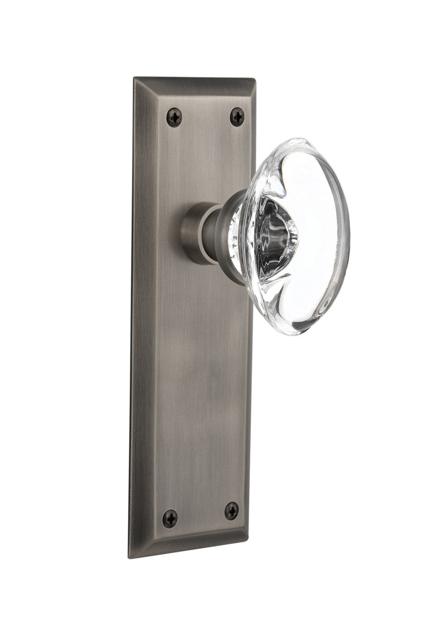 Nostalgic 711342: New York Backplate w/Oval Clear Glass Crystal Knob Passage Door Set - Antique Pewter