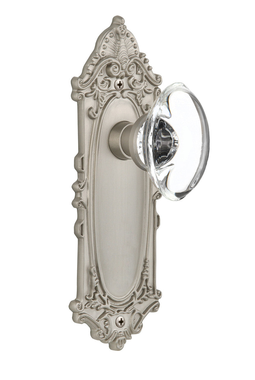 Nostalgic 711360: Victorian Backplate w/Oval Clear Glass Crystal Knob Passage Door Set - Satin Nickel