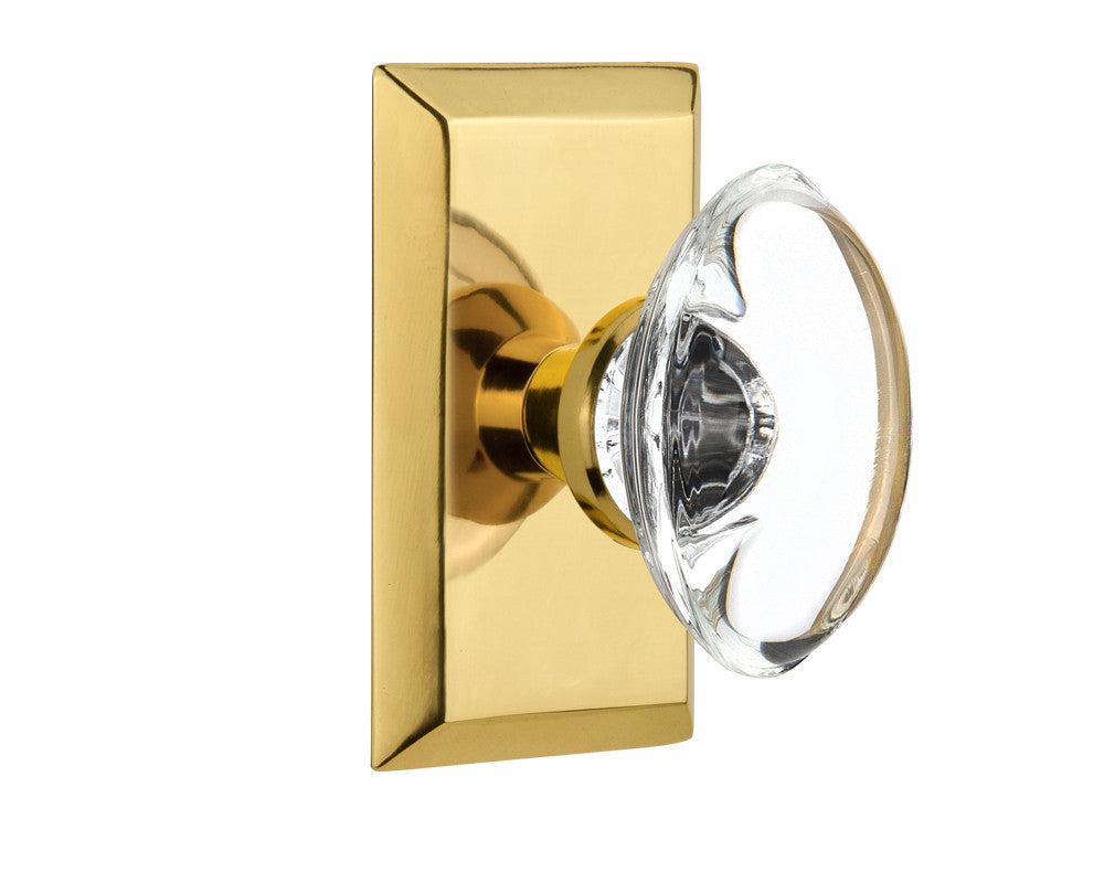 Nostalgic 711371: Studio Backplate w/Oval Clear Glass Crystal Knob Passage Door Set - Polished Brass