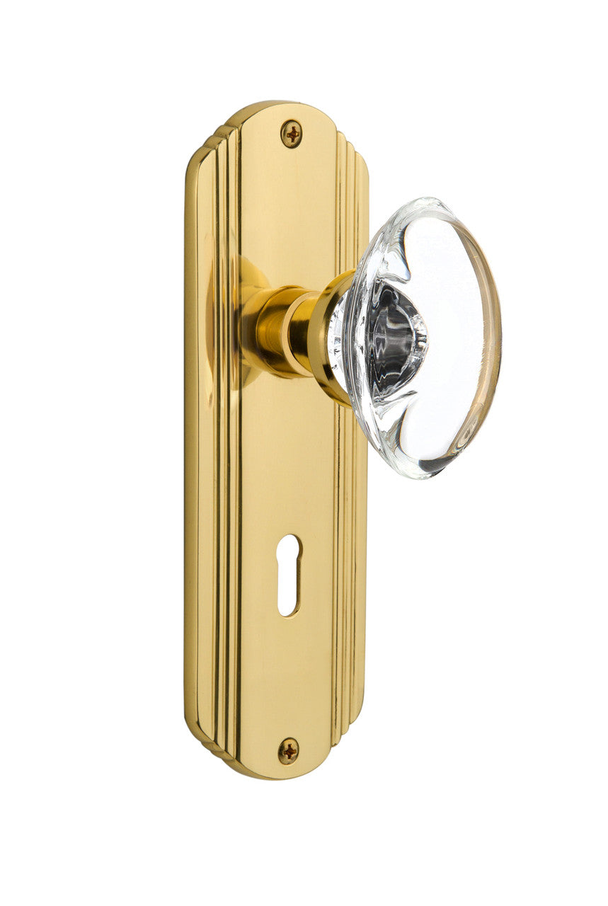 Nostalgic 711378: Deco Backplate w/Oval Clear Glass Crystal Knob Passage Door Set - Polished Brass