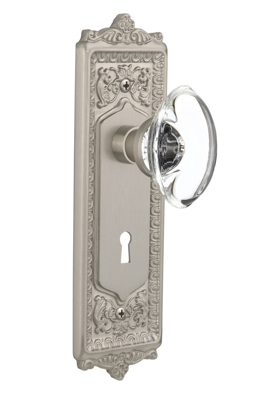 Nostalgic 711386: Egg & Dart Backplate w/Oval Clear Glass Crystal Knob Passage Door Set - Satin Nickel