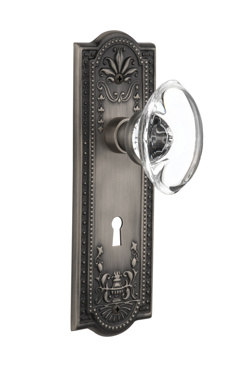 Nostalgic 711389: Meadows Backplate w/Oval Clear Glass Crystal Knob Passage Door Set - Antique Pewter