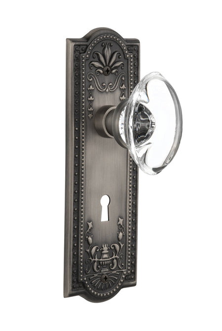 Nostalgic 711389: Meadows Backplate w/Oval Clear Glass Crystal Knob Passage Door Set - Antique Pewter