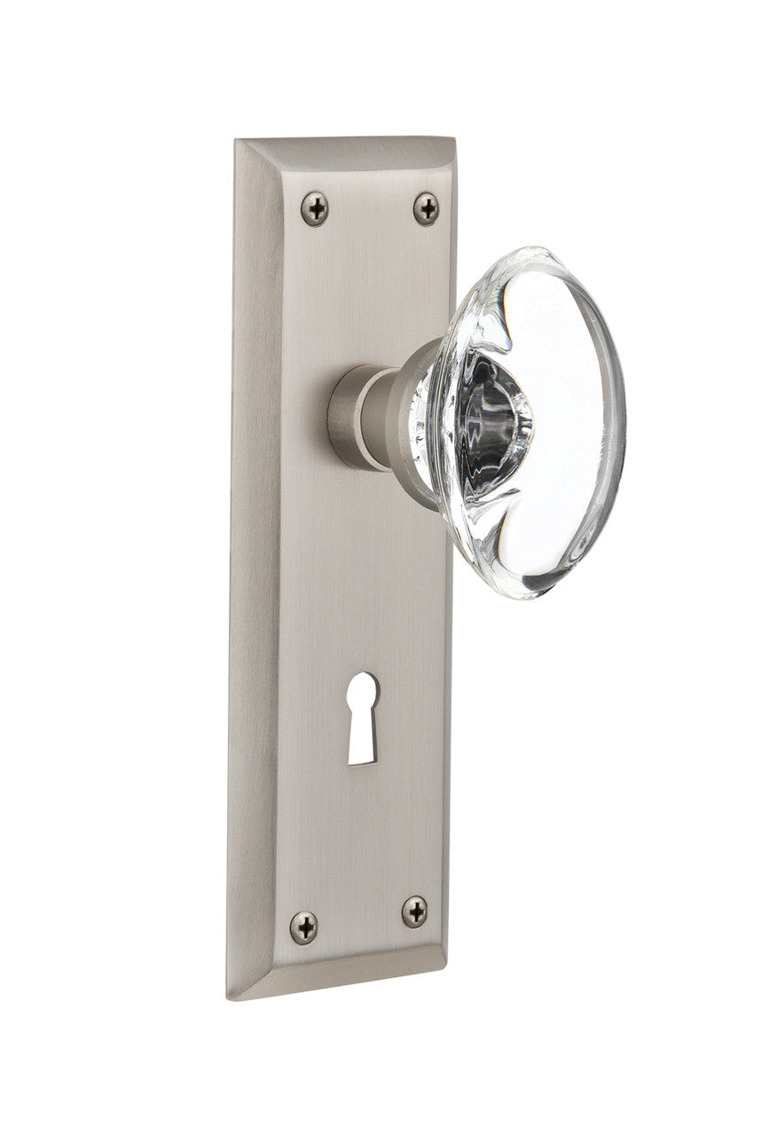 Nostalgic 711400: New York Backplate w/Oval Clear Glass Crystal Knob Passage Door Set - Satin Nickel