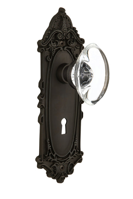 Nostalgic 711412: Victorian Backplate w/Oval Clear Glass Crystal Knob Passage Door Set - Oil-Rubbed Bronze