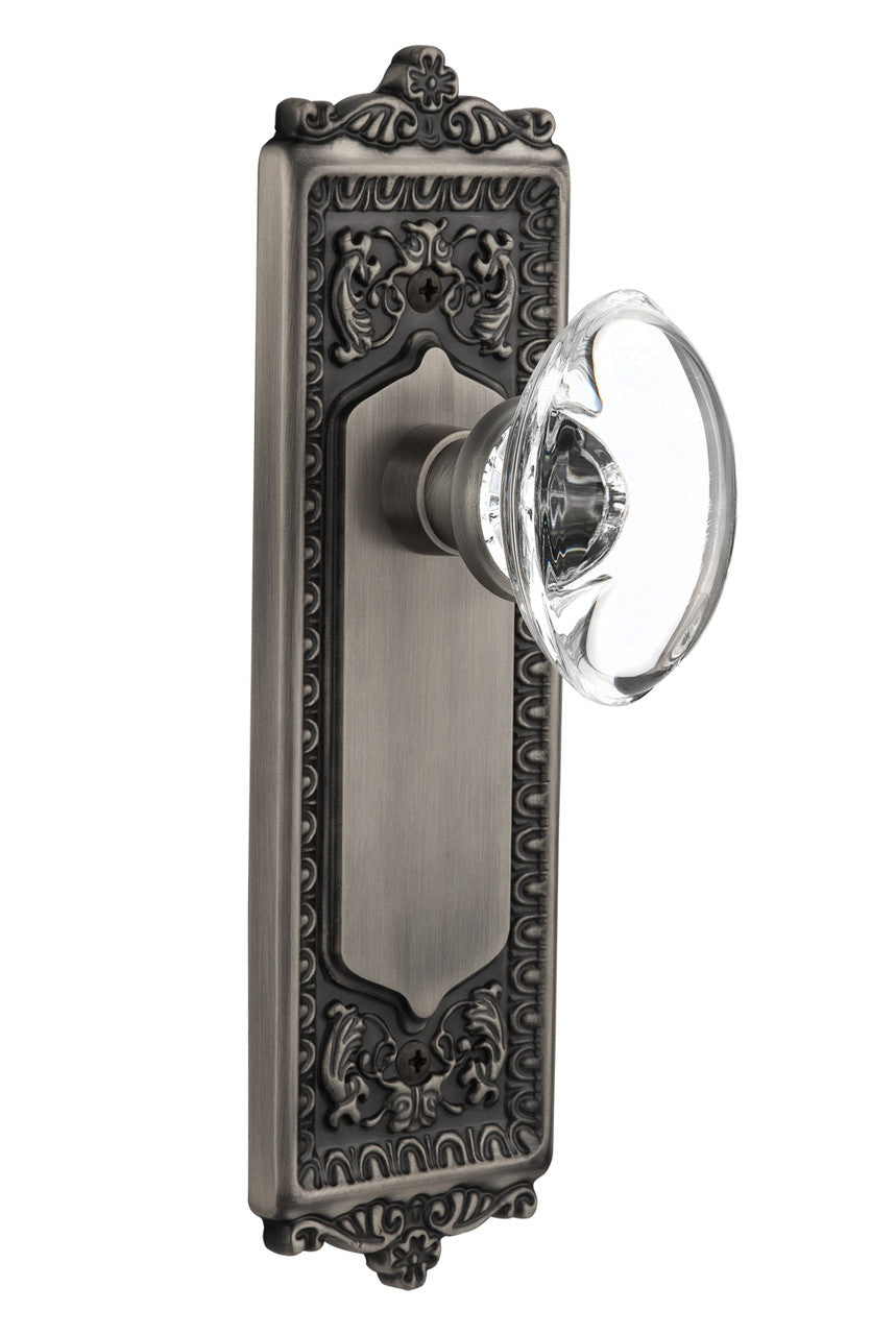 Nostalgic 711424: Egg & Dart Backplate w/Oval Clear Glass Crystal Knob Single Dummy Door Set - Antique Pewter