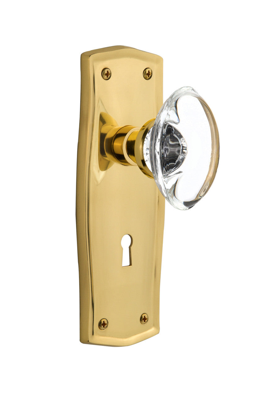 Nostalgic 711502: Prairie Backplate w/Oval Clear Glass Crystal Knob Single Dummy Door Set - Polished Brass