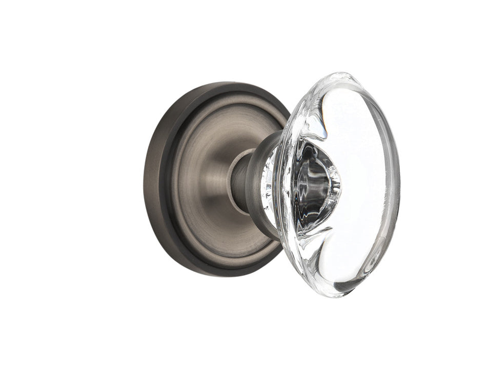 Nostalgic 711609: Classic Rosette w/Oval Clear Glass Crystal Knob Privacy Door Set - Antique Pewter