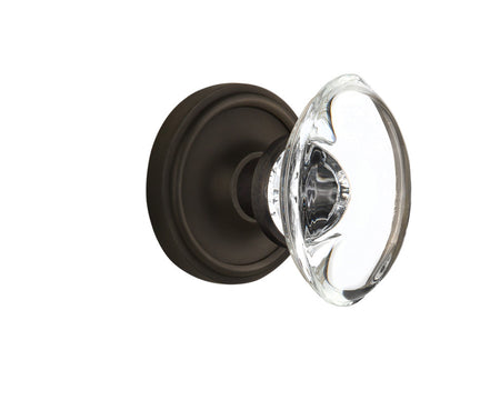 Nostalgic 711611: Classic Rosette w/Oval Clear Glass Crystal Knob Privacy Door Set - Oil-Rubbed Bronze