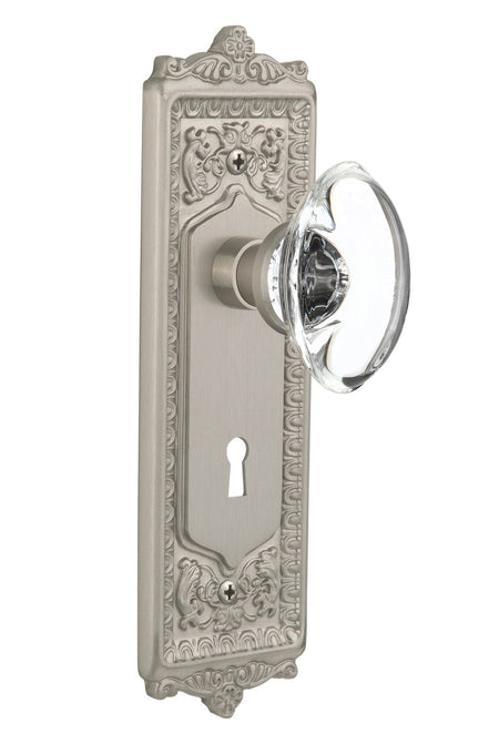 Nostalgic 711674: Egg & Dart Backplate w/Oval Clear Glass Crystal Knob Privacy Door Set - Satin Nickel