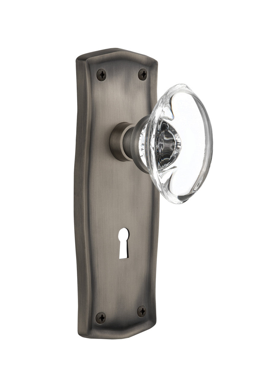Nostalgic 711691: Prairie Backplate w/Oval Clear Glass Crystal Knob Privacy Door Set - Antique Pewter