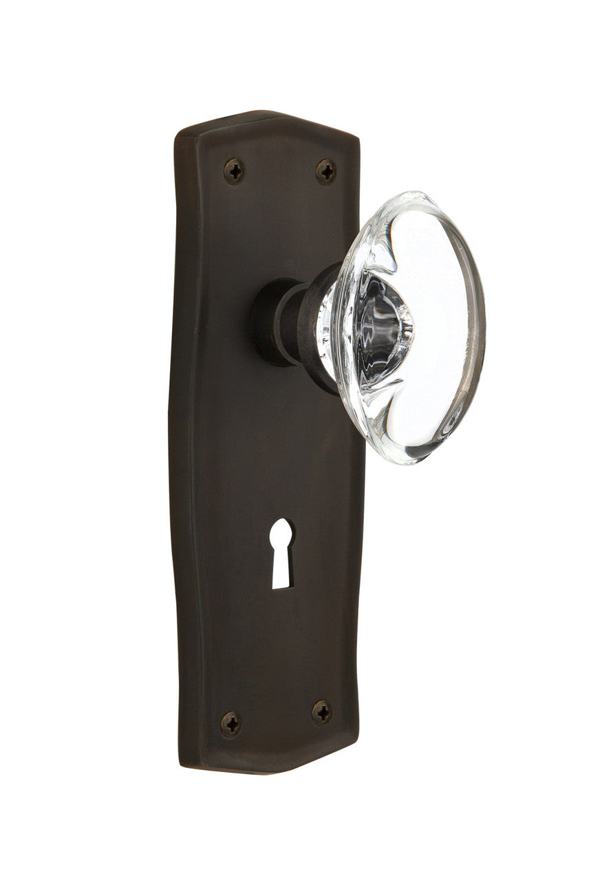 Nostalgic 711693: Prairie Backplate w/Oval Clear Glass Crystal Knob Privacy Door Set - Oil-Rubbed Bronze