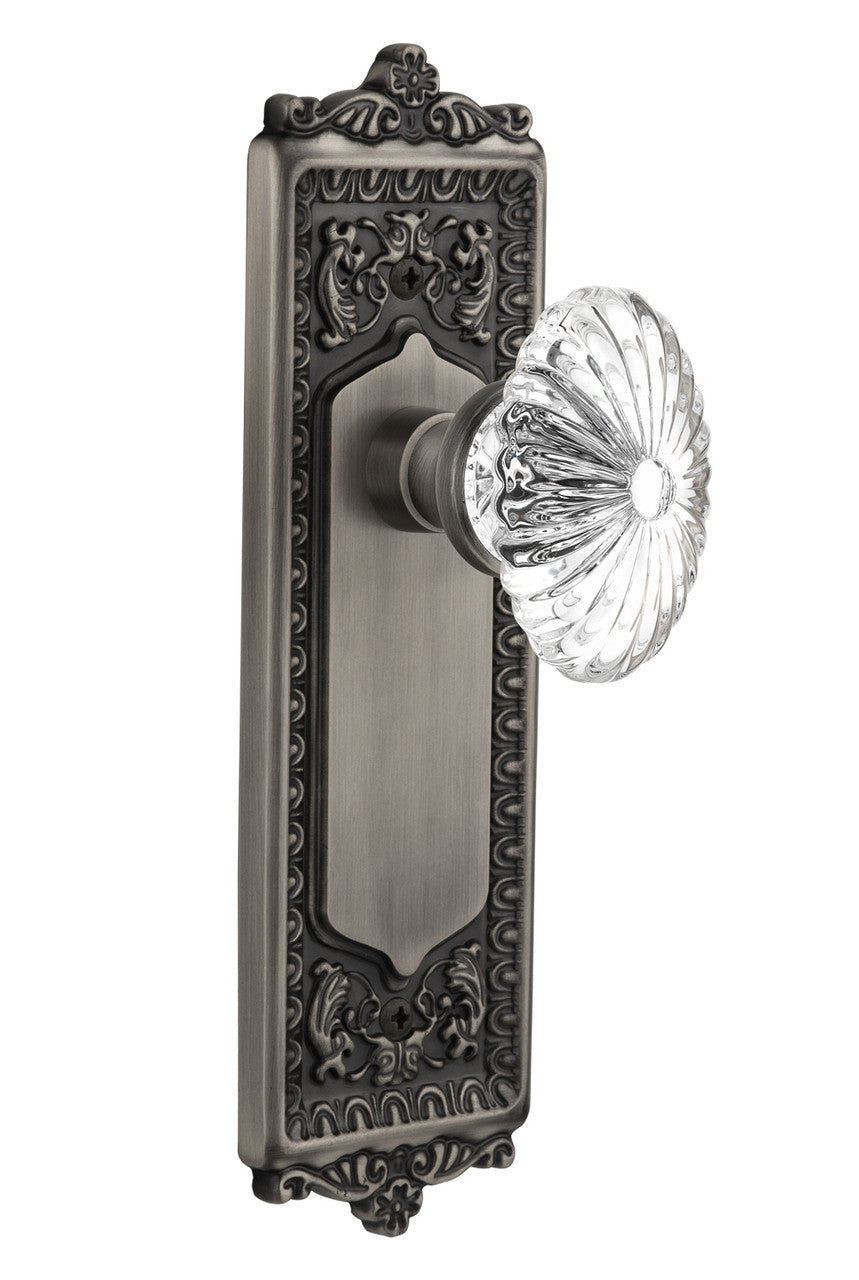 Nostalgic 711768: Egg & Dart Backplate w/Oval Fluted Clear Glass Crystal Knob Passage Door Set - Antique Pewter