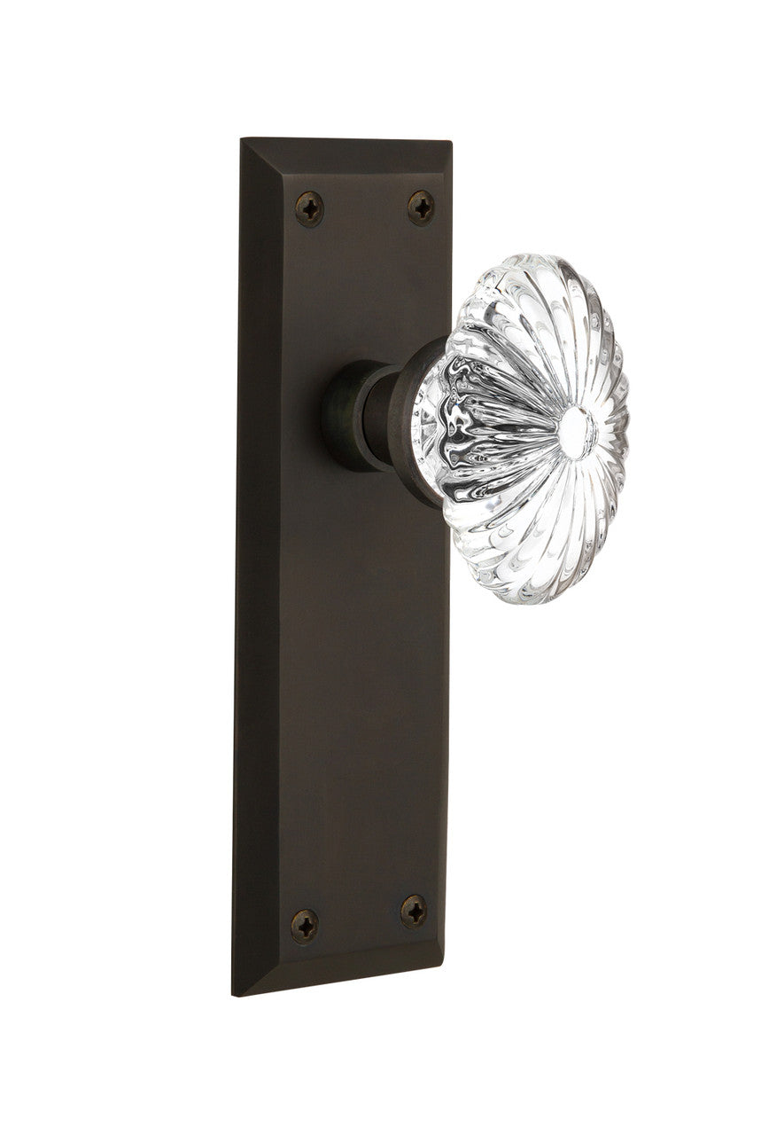 Nostalgic 711784: New York Backplate w/Oval Fluted Clear Glass Crystal Knob Passage Door Set - Oil-Rubbed Bronze