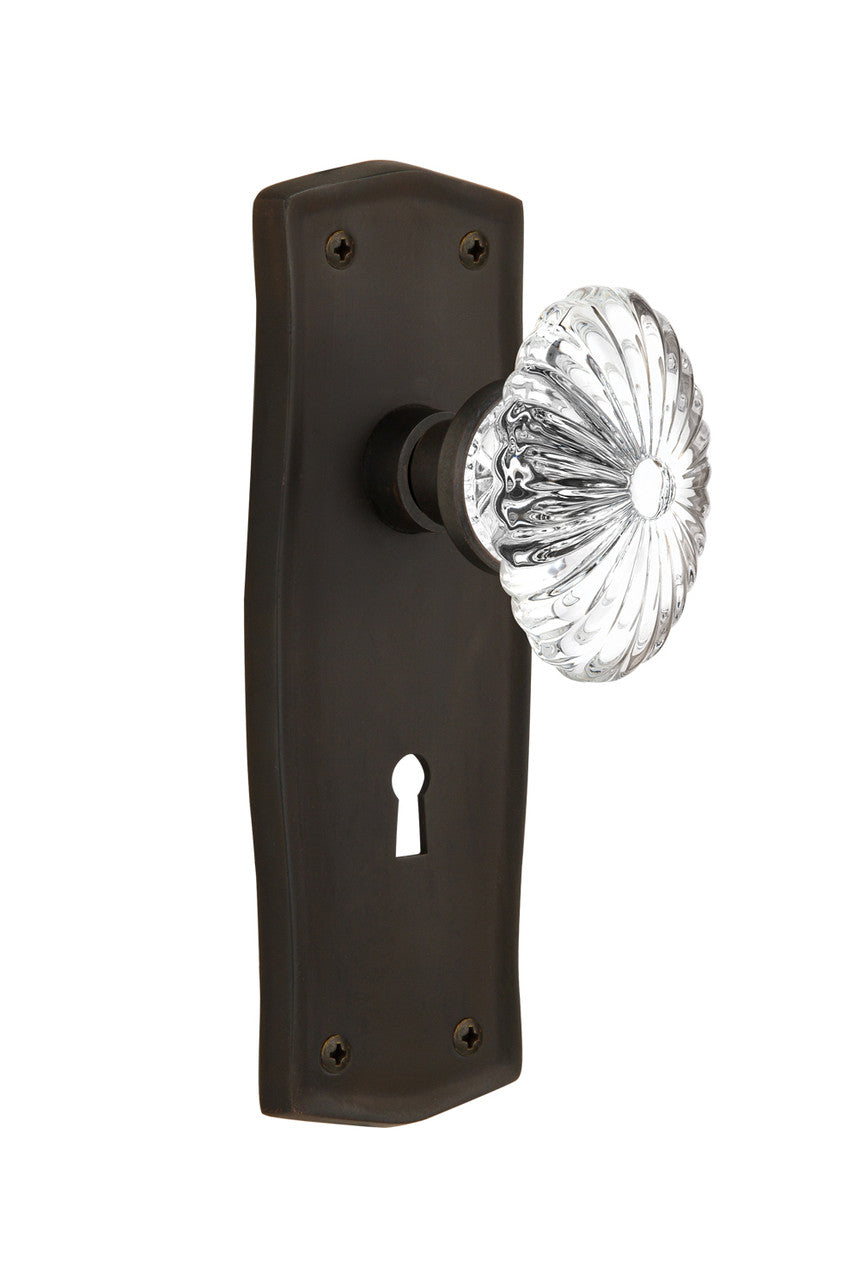 Nostalgic 711845: Prairie Backplate w/Oval Fluted Clear Glass Crystal Knob Passage Door Set - Oil-Rubbed Bronze