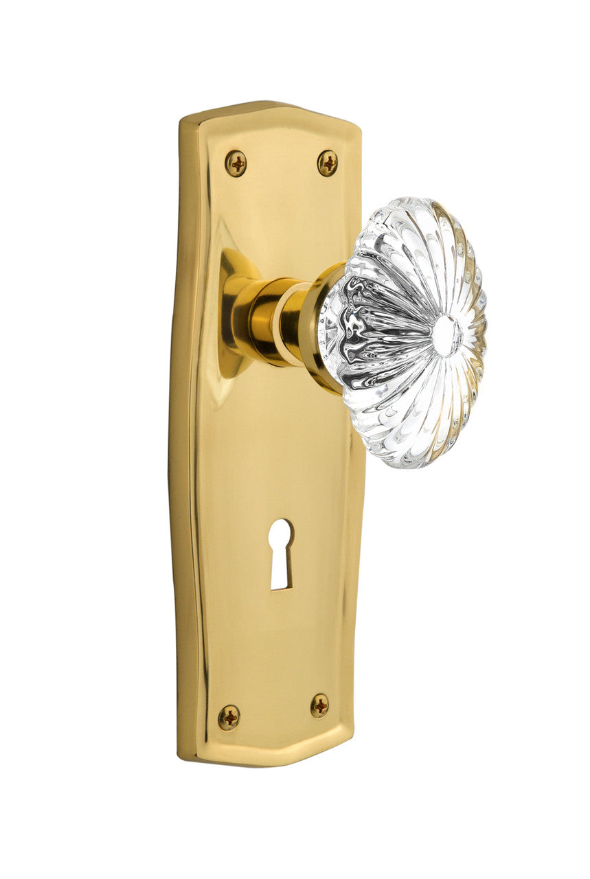Nostalgic 711846: Prairie Backplate w/Oval Fluted Clear Glass Crystal Knob Passage Door Set - Polished Brass