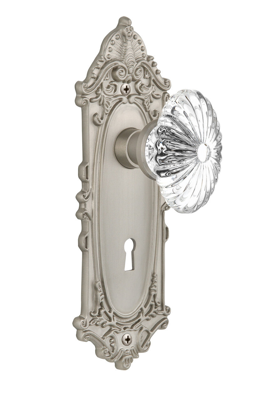 Nostalgic 711854: Victorian Backplate w/Oval Fluted Clear Glass Crystal Knob Passage Door Set - Satin Nickel