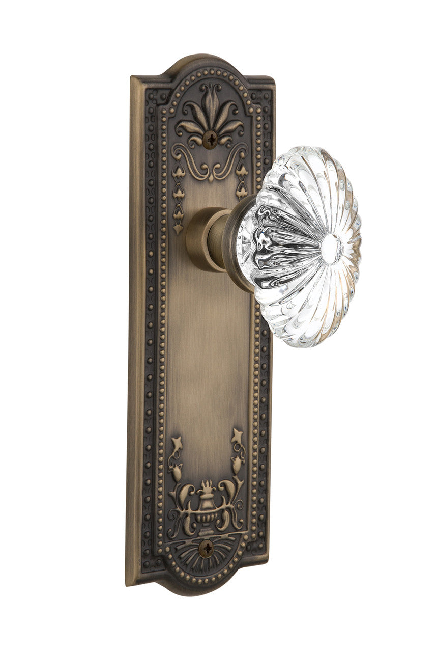 Nostalgic 711870: Meadows Backplate w/Oval Fluted Clear Glass Crystal Knob Single Dummy Door Set - Antique Brass
