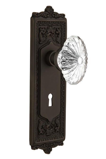 Nostalgic 711920: Egg & Dart Backplate w/Oval Fluted Clear Glass Crystal Knob Single Dummy Door Set - Oil-Rubbed Bronze