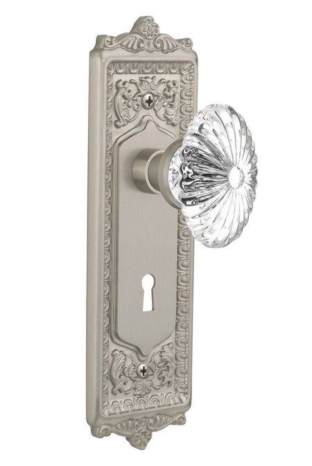 Nostalgic 711922: Egg & Dart Backplate w/Oval Fluted Clear Glass Crystal Knob Single Dummy Door Set - Satin Nickel
