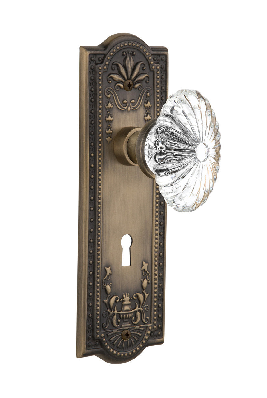 Nostalgic 711924: Meadows Backplate w/Oval Fluted Clear Glass Crystal Knob Single Dummy Door Set - Antique Brass