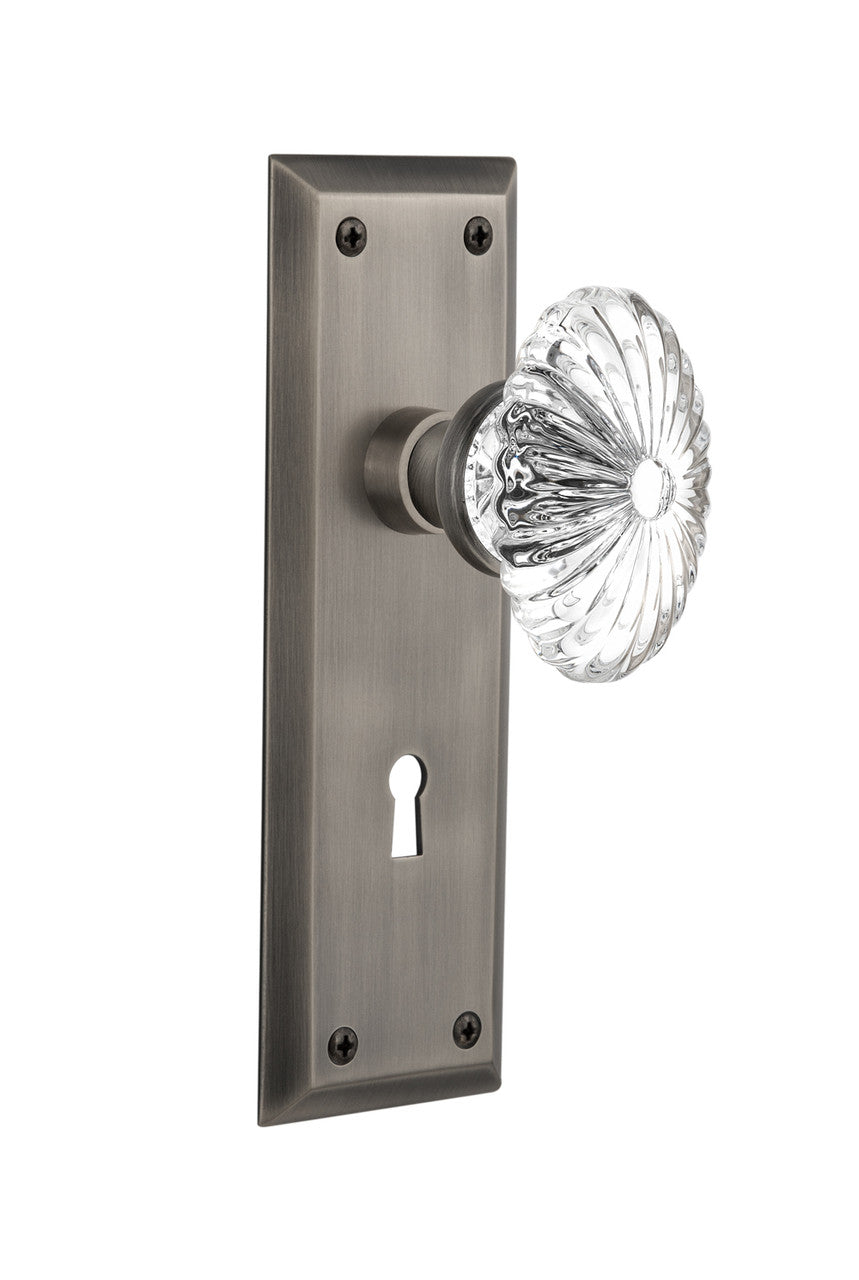 Nostalgic 711932: New York Backplate w/Oval Fluted Clear Glass Crystal Knob Single Dummy Door Set - Antique Pewter