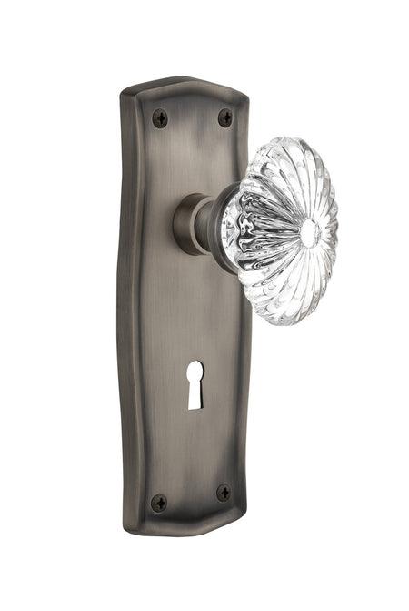 Nostalgic 711939: Prairie Backplate w/Oval Fluted Clear Glass Crystal Knob Single Dummy Door Set - Antique Pewter
