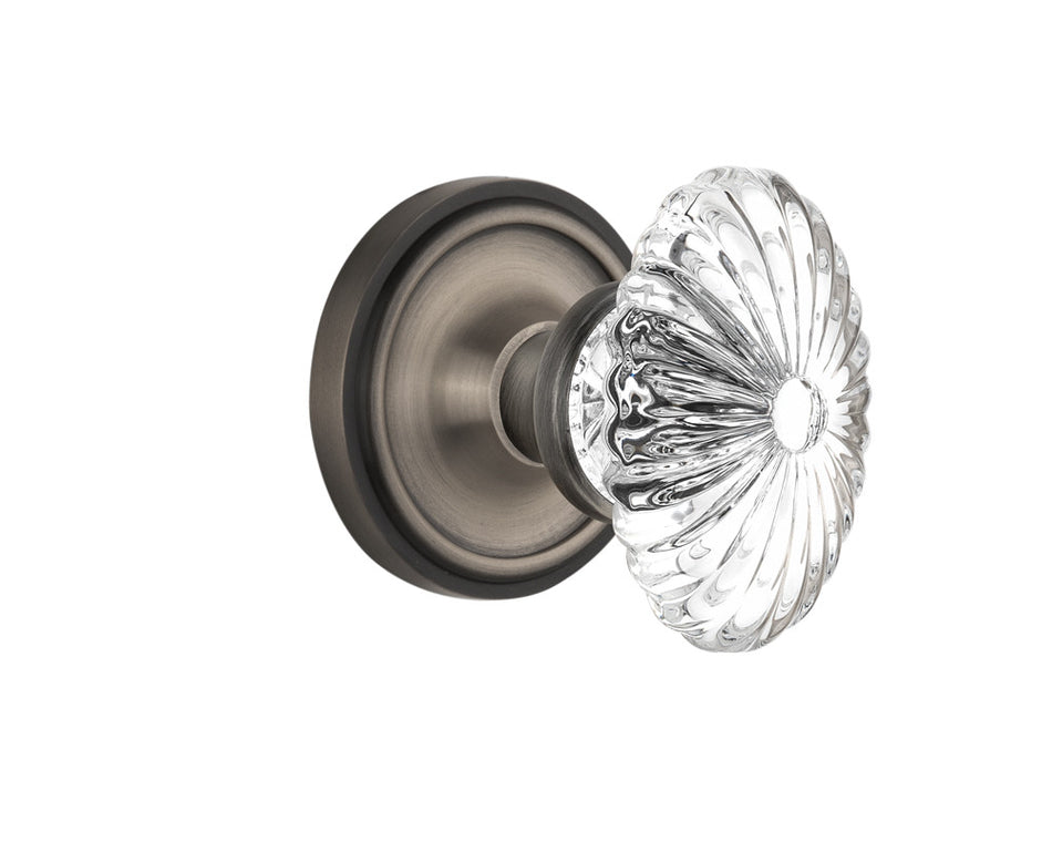 Nostalgic 712049: Classic Rosette w/Oval Fluted Clear Glass Crystal Knob Privacy Door Set - Antique Pewter