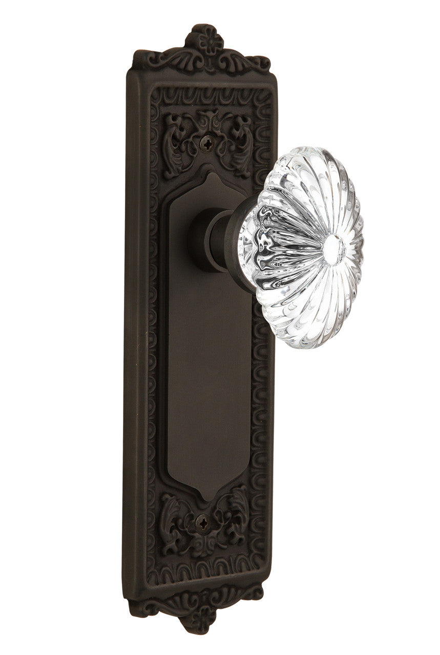 Nostalgic 712058: Egg & Dart Backplate w/Oval Fluted Clear Glass Crystal Knob Privacy Door Set - Oil-Rubbed Bronze