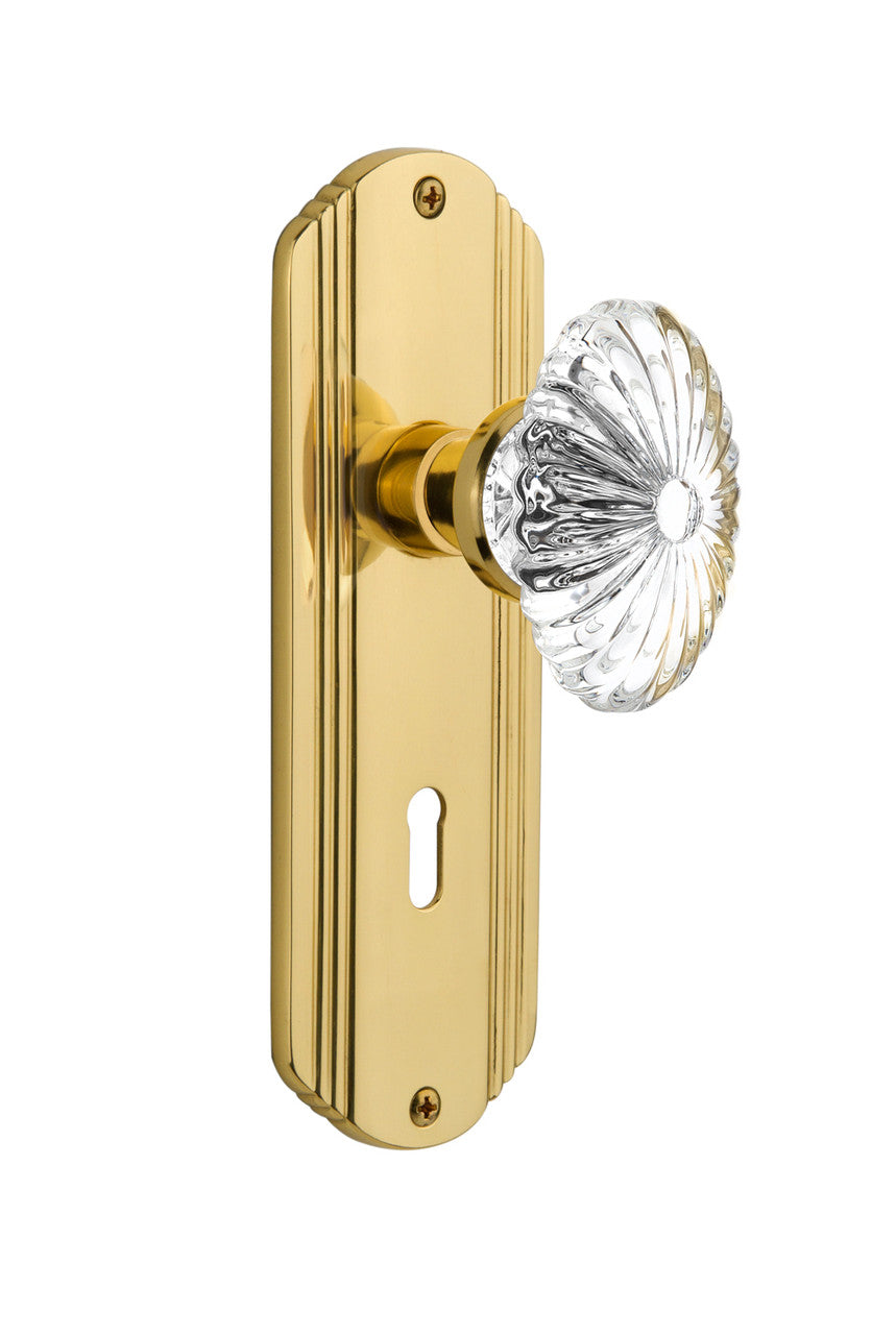Nostalgic 712106: Deco Backplate w/Oval Fluted Clear Glass Crystal Knob Privacy Door Set - Polished Brass