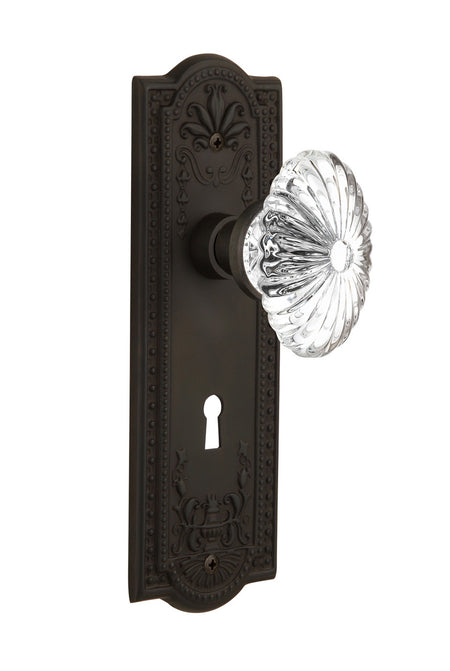 Nostalgic 712119: Meadows Backplate w/Oval Fluted Clear Glass Crystal Knob Privacy Door Set - Oil-Rubbed Bronze