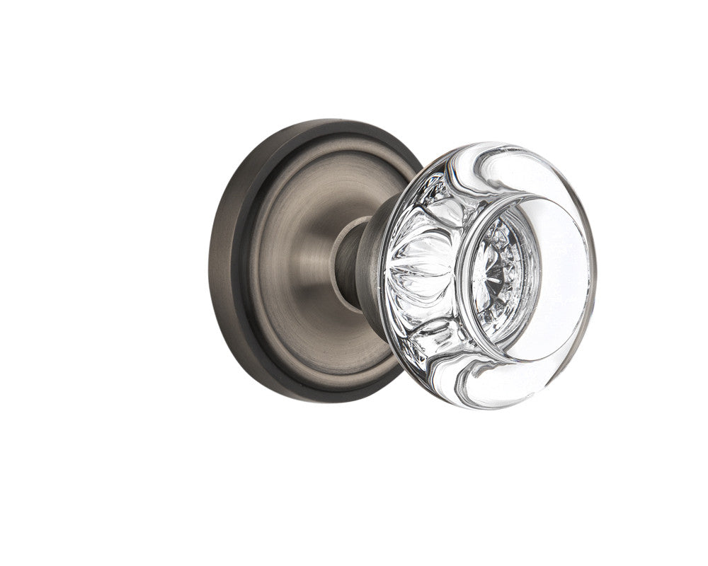 Nostalgic 712201: Classic Rosette w/Round Clear Glass Crystal Knob Passage Door Set - Antique Pewter