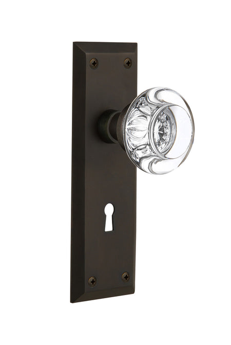 Nostalgic 712278: New York Backplate w/Round Clear Glass Crystal Knob Passage Door Set - Oil-Rubbed Bronze