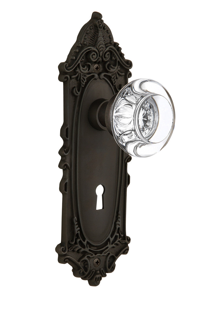 Nostalgic 712292: Victorian Backplate w/Round Clear Glass Crystal Knob Passage Door Set - Oil-Rubbed Bronze