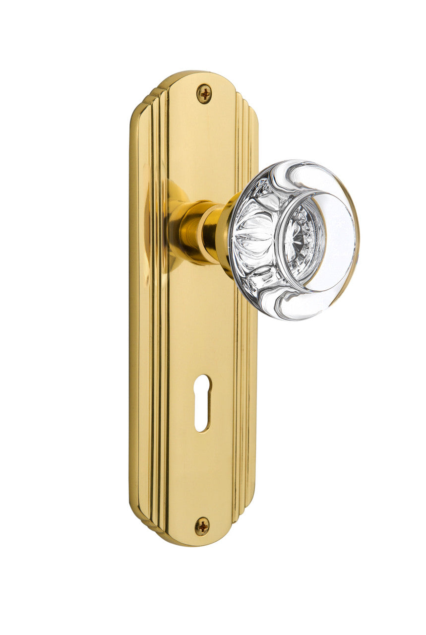 Nostalgic 712546: Deco Backplate w/Round Clear Glass Crystal Knob Privacy Door Set - Polished Brass
