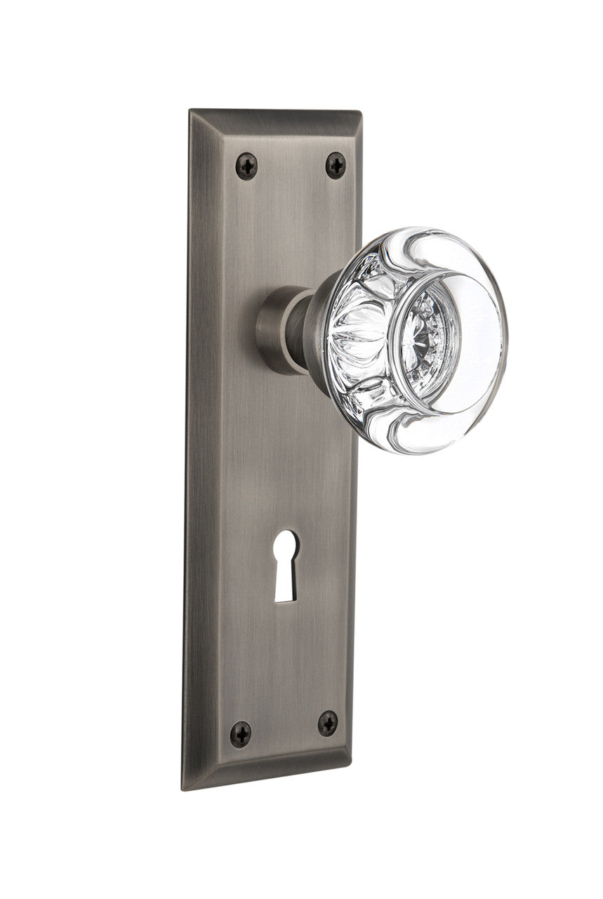 Nostalgic 712564: New York Backplate w/Round Clear Glass Crystal Knob Privacy Door Set - Antique Pewter