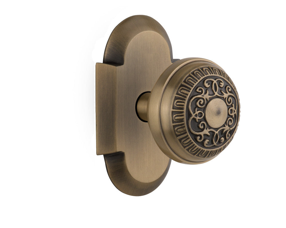 Nostalgic 712807: Cottage Backplate w/Egg & Dart Knob Passage Door Set - Antique Brass