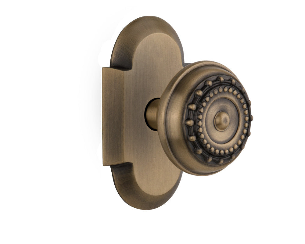Nostalgic 712821: Cottage Backplate w/Meadows Knob Passage Door Set - Antique Brass