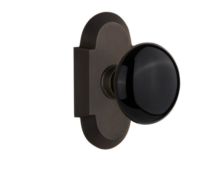 Nostalgic 712878: Cottage Backplate w/Black Porcelain Knob Passage Door Set - Oil-Rubbed Bronze