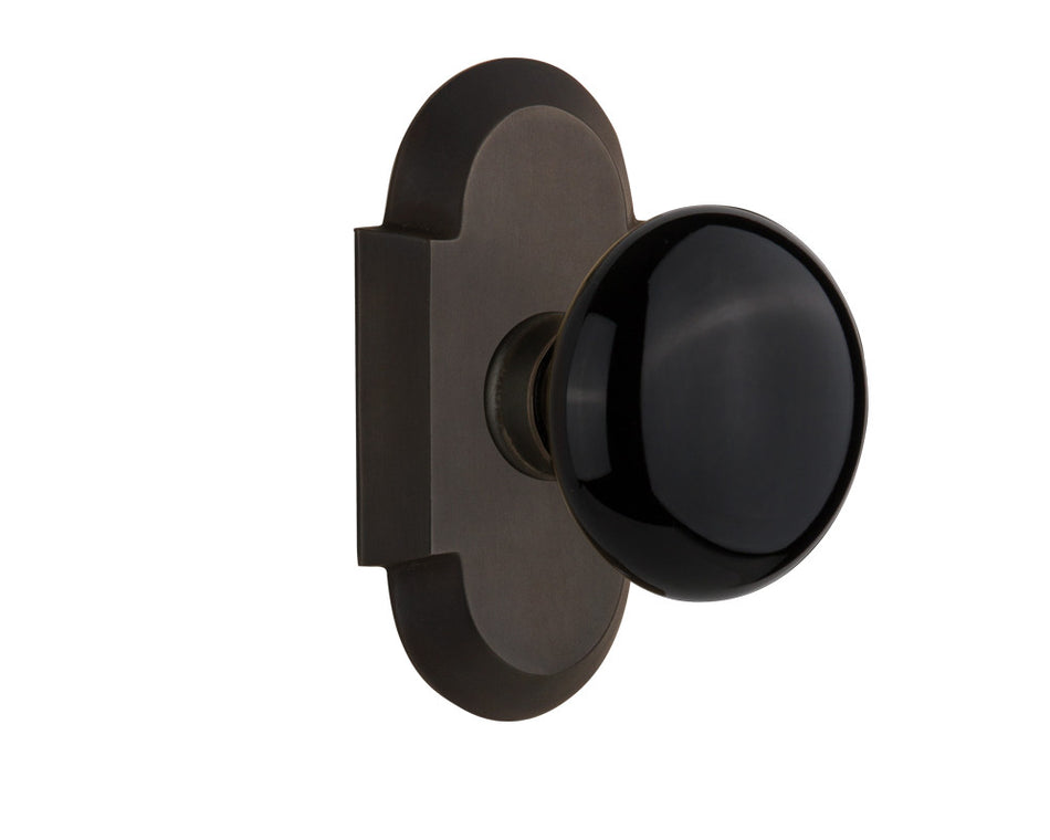 Nostalgic 712878: Cottage Backplate w/Black Porcelain Knob Passage Door Set - Oil-Rubbed Bronze