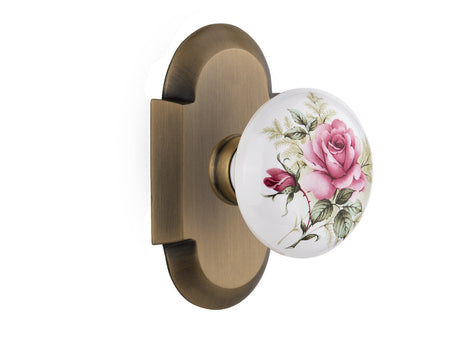Nostalgic 713047: Cottage Backplate w/White Rose Porcelain Knob Single Dummy Door Set - Antique Brass