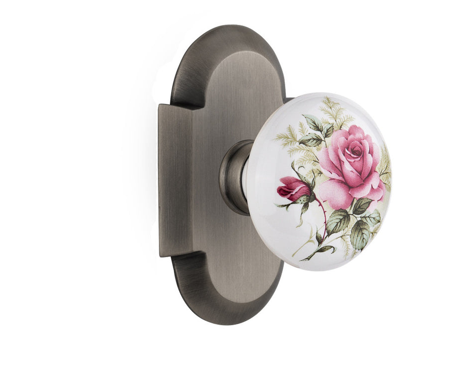 Nostalgic 713048: Cottage Backplate w/White Rose Porcelain Knob Single Dummy Door Set - Antique Pewter
