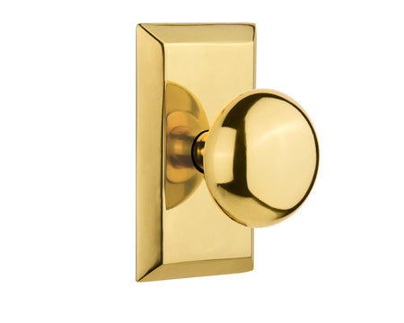 Nostalgic 713239: Studio Backplate w/New York Knob Passage Door Set - Polished Brass
