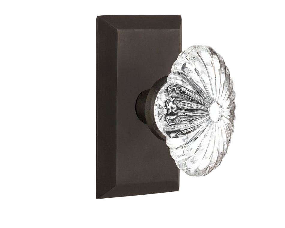 Nostalgic 713252: Studio Backplate w/Oval Fluted Clear Glass Crystal Knob Passage Door Set - Oil-Rubbed Bronze