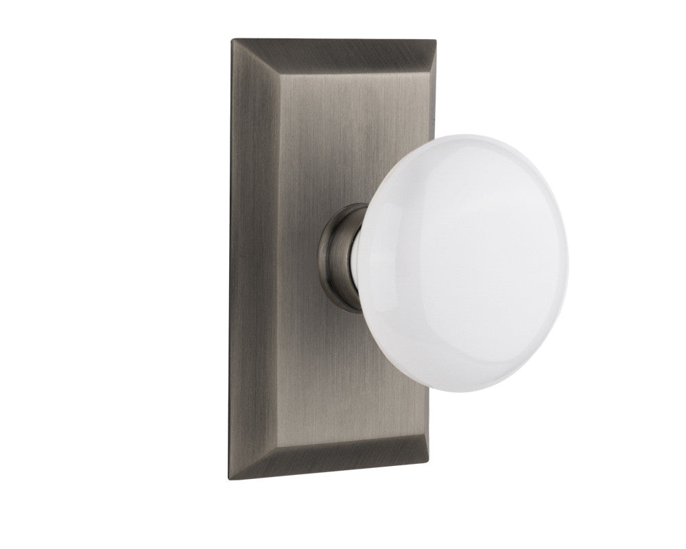 Nostalgic 713298: Studio Backplate w/White Porcelain Knob Passage Door Set - Antique Pewter